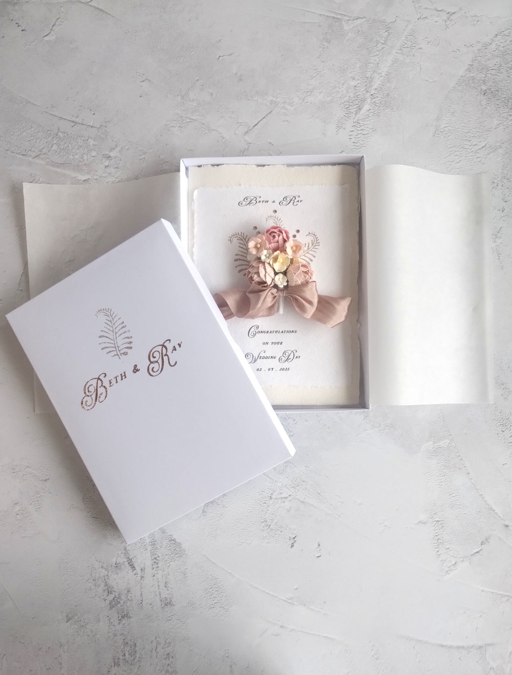 Handmade Boxed Pink A5 Wedding card with floral design.