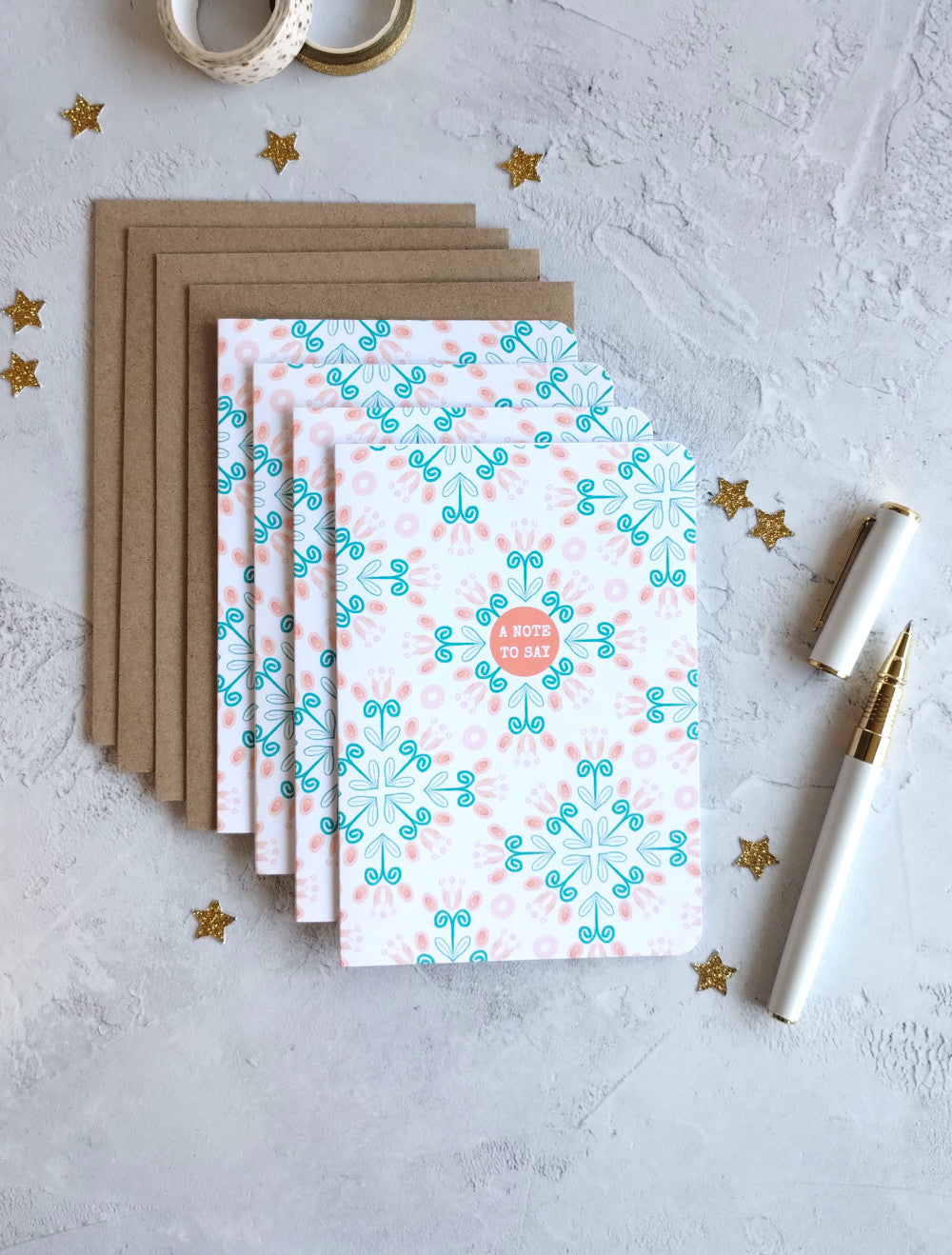 Set of four teal and pink patterned Summa Tulips note cards.