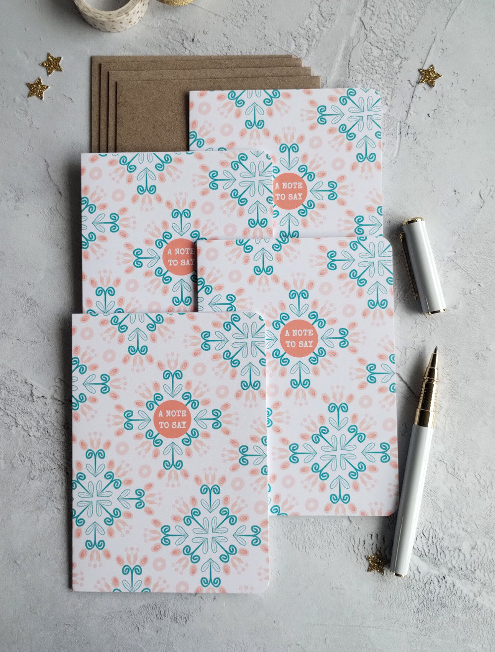 Set of four teal and pink patterned Summa Tulips note cards.