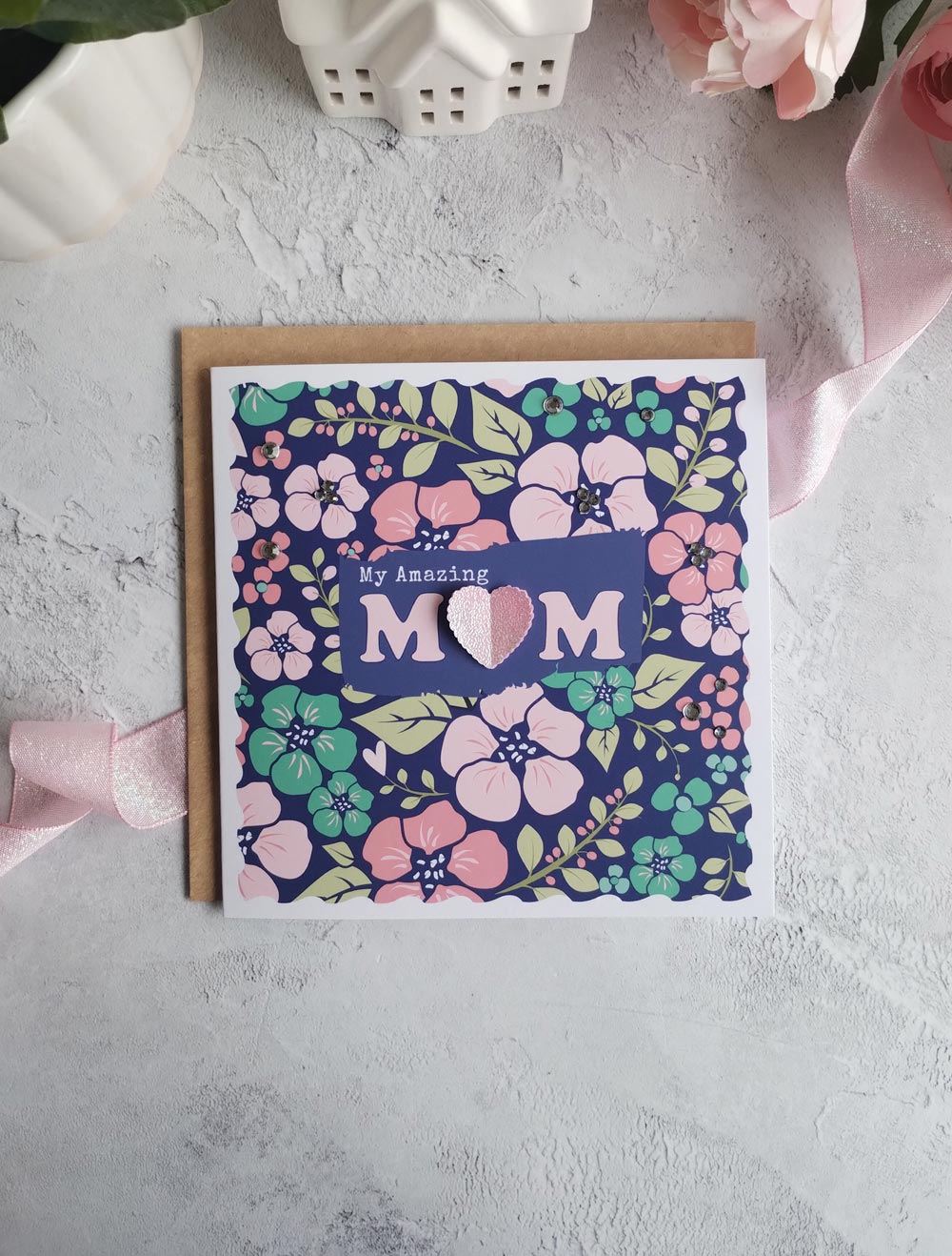 Bold floral Mother's day greeting card with a deep blue background and pink pop-out heart