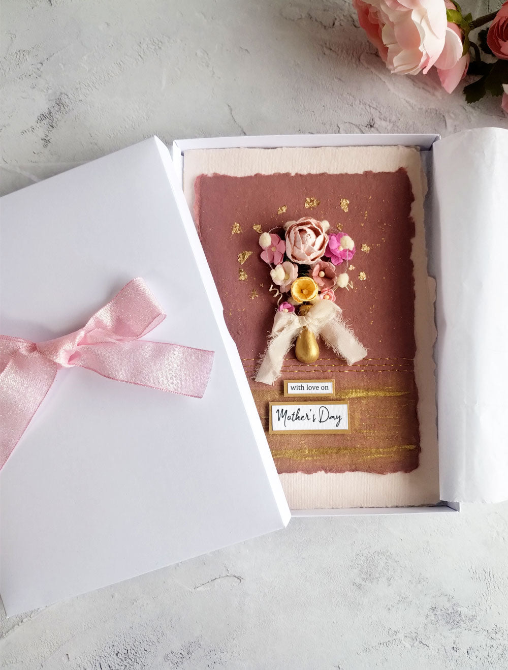 Natural recycled cotton rag Mother's day card with hand painted vase and a bouquet of handmade paper flowers