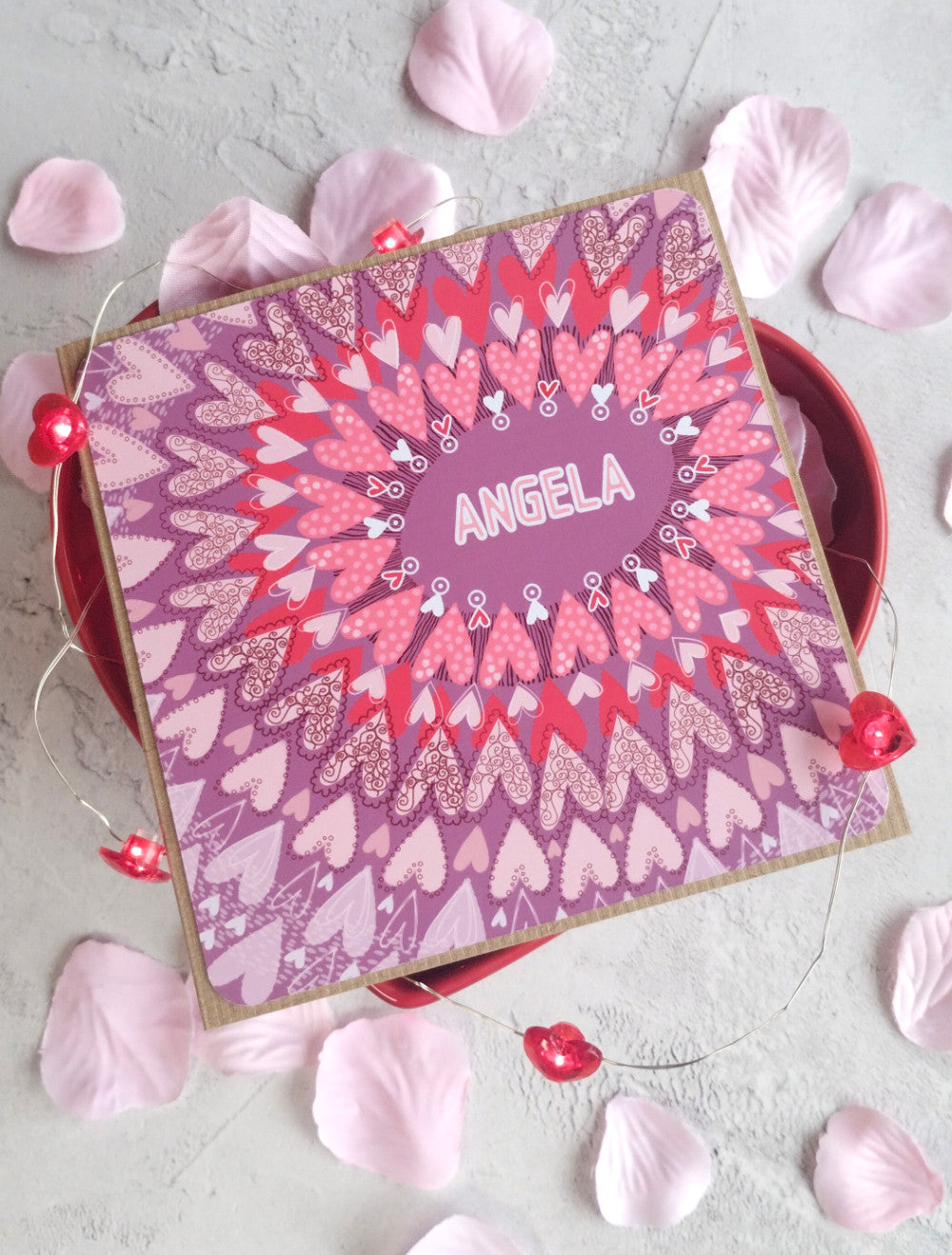 Lavender Love heart pattern greeting card with pink petals and heart lights