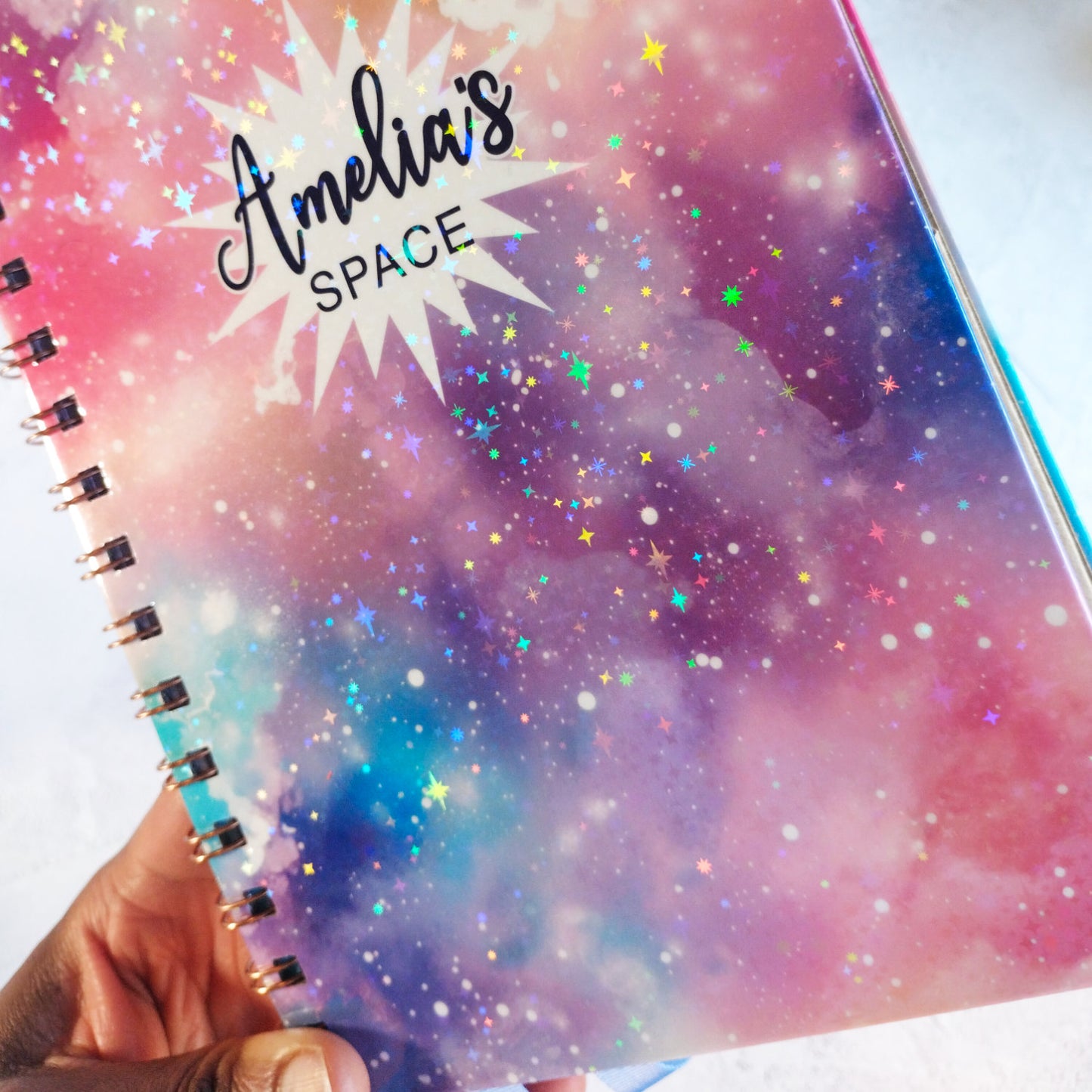 Close up of Dream Space notebook's holographic cover