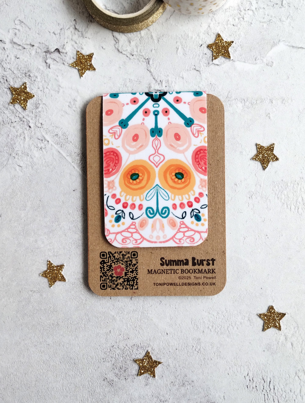 Summa Burst Magnetic bookmark with bright colourful pattern design on a textured surface with decorative stars