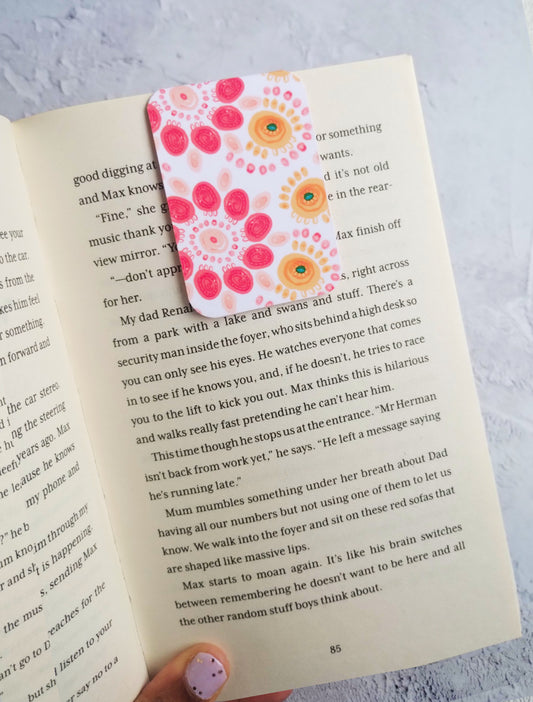 Summa Carnival bookmark in an open book 