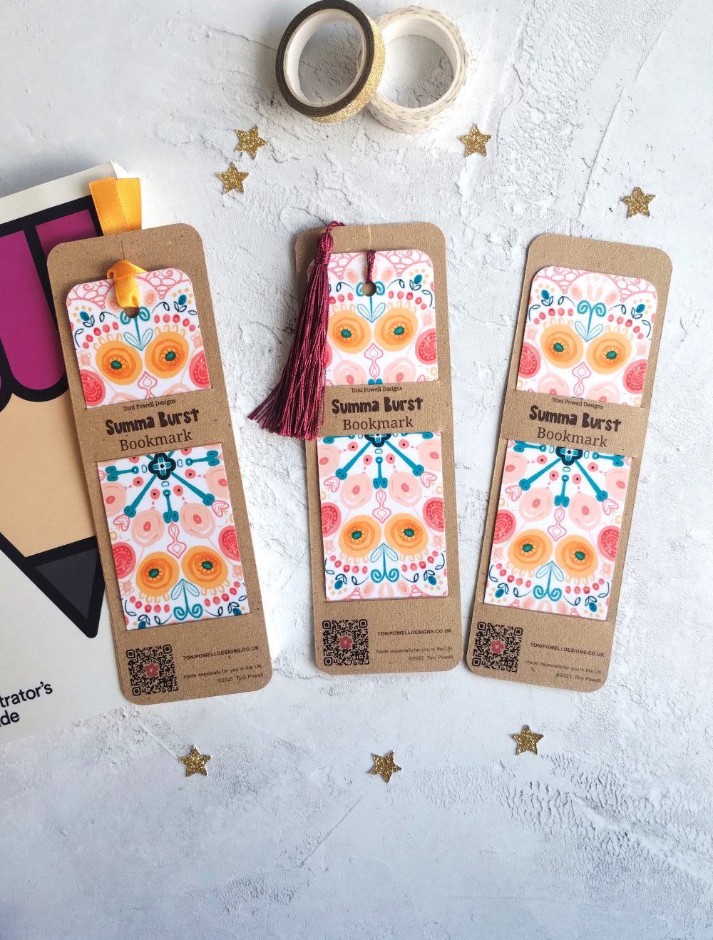 Three handmade patterned bookmarks from the Summa Burst range with decorative background stars and washi tape