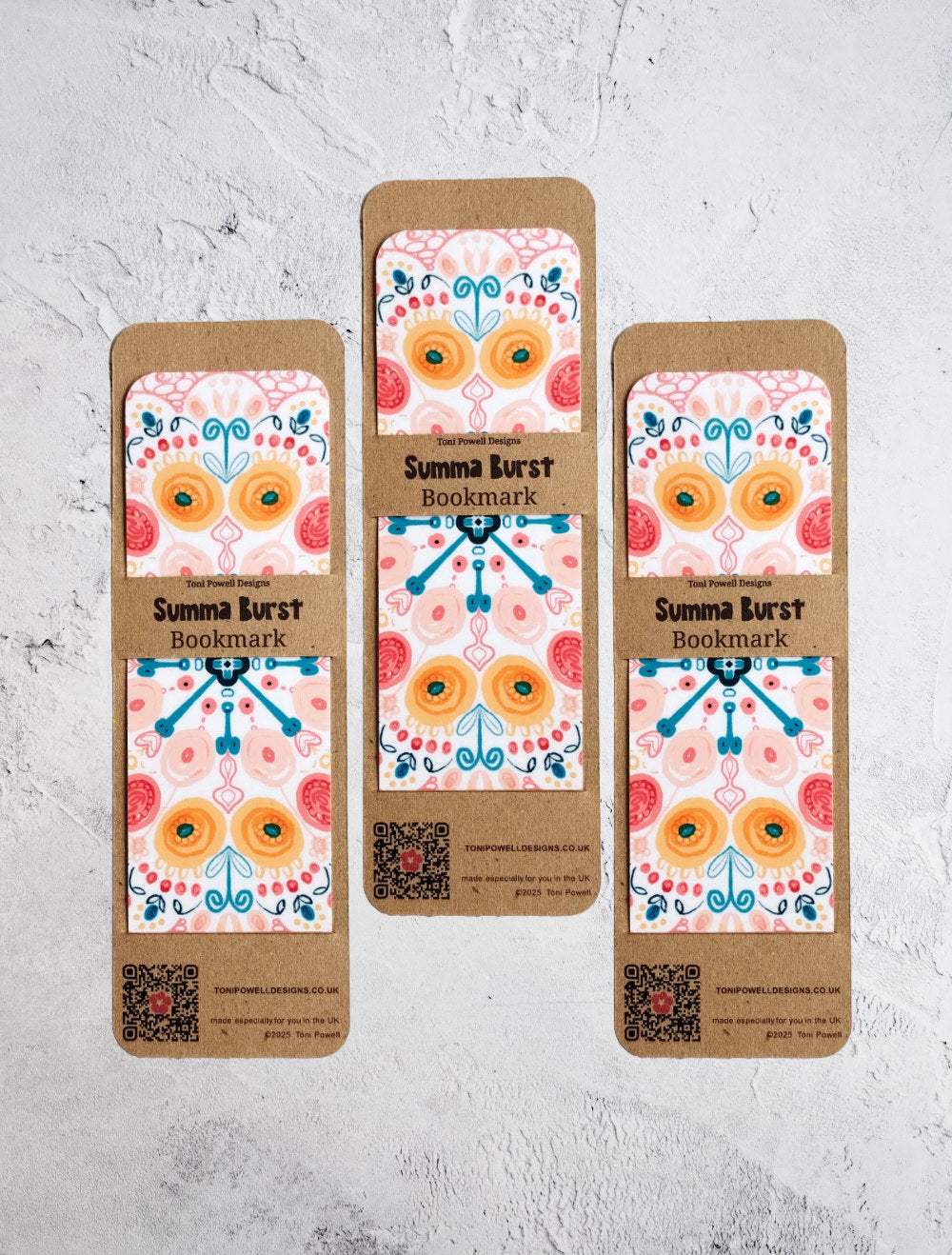 Summa Burst classic set of three bookmarks with colourful designs on a textured white background